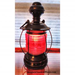 Authentic, early 20th century ship‽s hurricane warning lamp with a thick ruby red glass Fresnel le