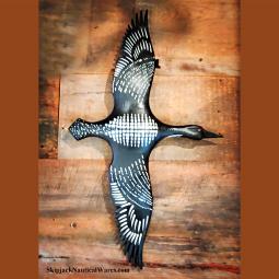 "Loon in Flight," hand carved and painted wood by Virginia artists Jac and Patricia Johnson