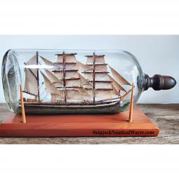 Handcrafted Ship-in-a-Bottle Depicting a 3-Masted Barkentine in Full Sail