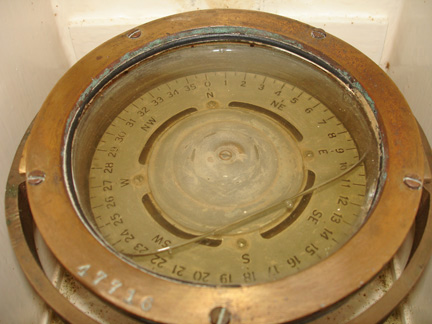 Vintage yacht binnacle with liquid filled compass, copper housing