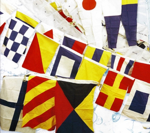 A line of 40 nautical flags measures a total over 50 feet in length. Each flag is made out of cotton