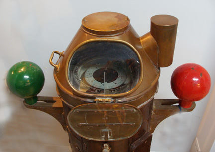 Kelvin_Hughes_ships_binnacle_compass_teak_pedestal_brass_helmet_closeup_nautica-_marine_maritime_compensating_balls_reg.jpg