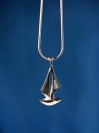 "J Boat" original sterling silver sailboat pendant from the Barbara Vincent Collection