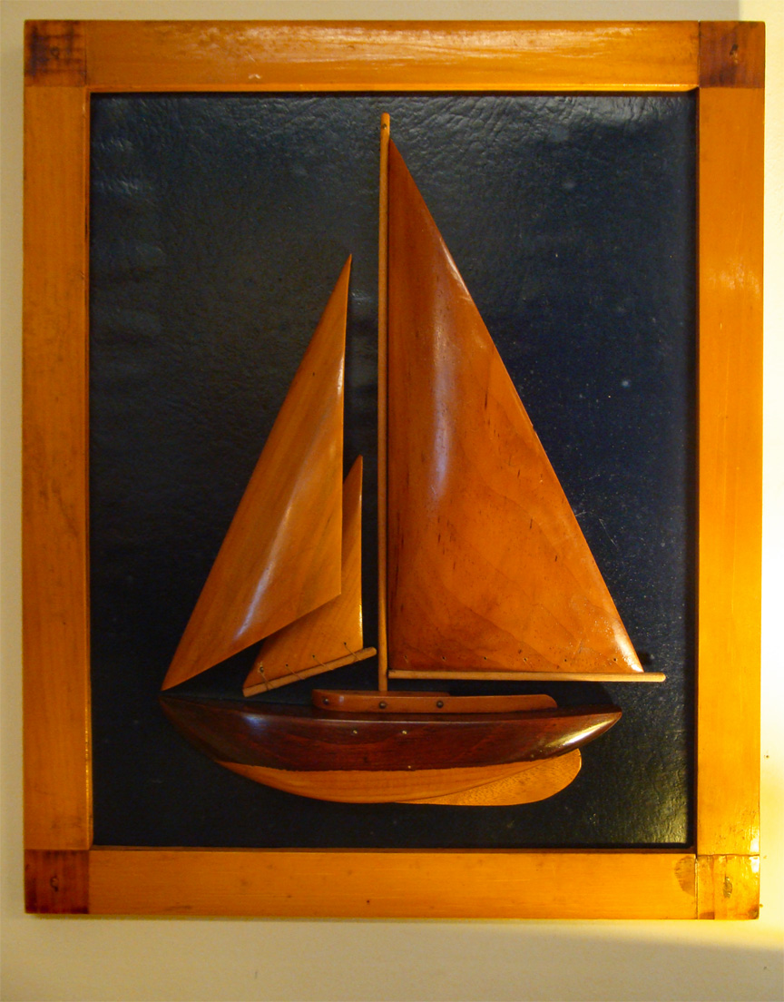 Mid 20th Century Carved Wood Sloop Half Hull With Wooden Sails Front View Of Mid 20th Century Half Hull Model A Sloop Sailboat Under Sail