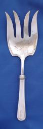 Cold meat serving fork from the Junior Grade Officer's Mess, U.S. Navy. Silverplate, made by Interna