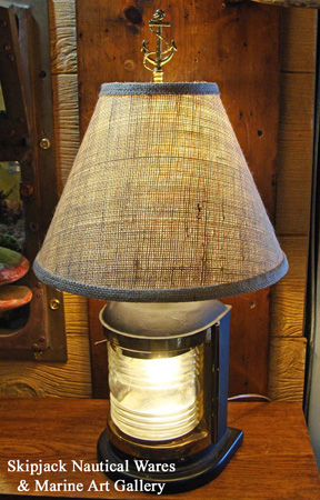 Painted ship's stern navigational light nautical table lamp. Painted ship's stern navigational light nautical table lamp.
