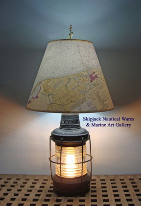 Authentic early 20th century anchor lantern re-purposed in to a table lamp. Authentic early 20th century anchor lantern re-purposed in to a table lamp.