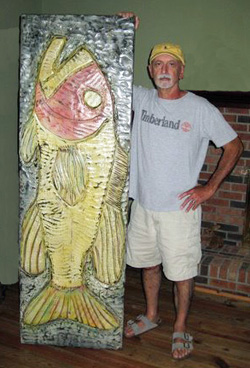 Folk artist Joe Marineeli created colorful folky fish carvings