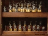 Maritime Apothecary Cabinet with Original Collection of Pharmacy Bottles and Jars, circa late 19th c