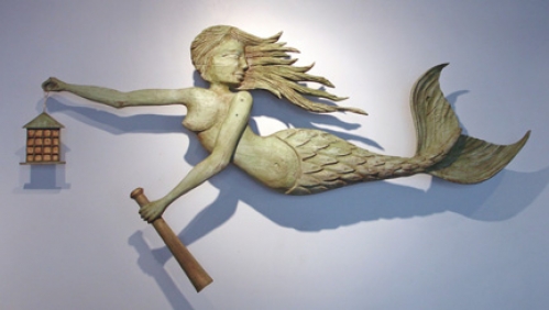 "Lighting the Way Mermaid" folk art carving by J & P Johnson -- length 60"